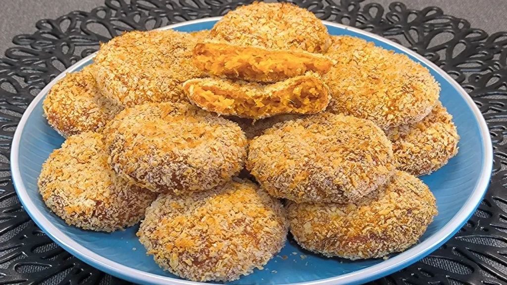 Tortitas crujientes de calabaza y queso fundido rebozadas en panko y cocinadas en freidora de aire